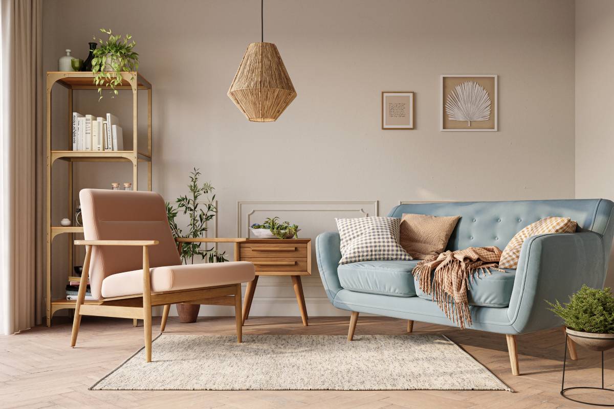 Living room with sofa, accent chair, end table, and area rug near Florence, KY
