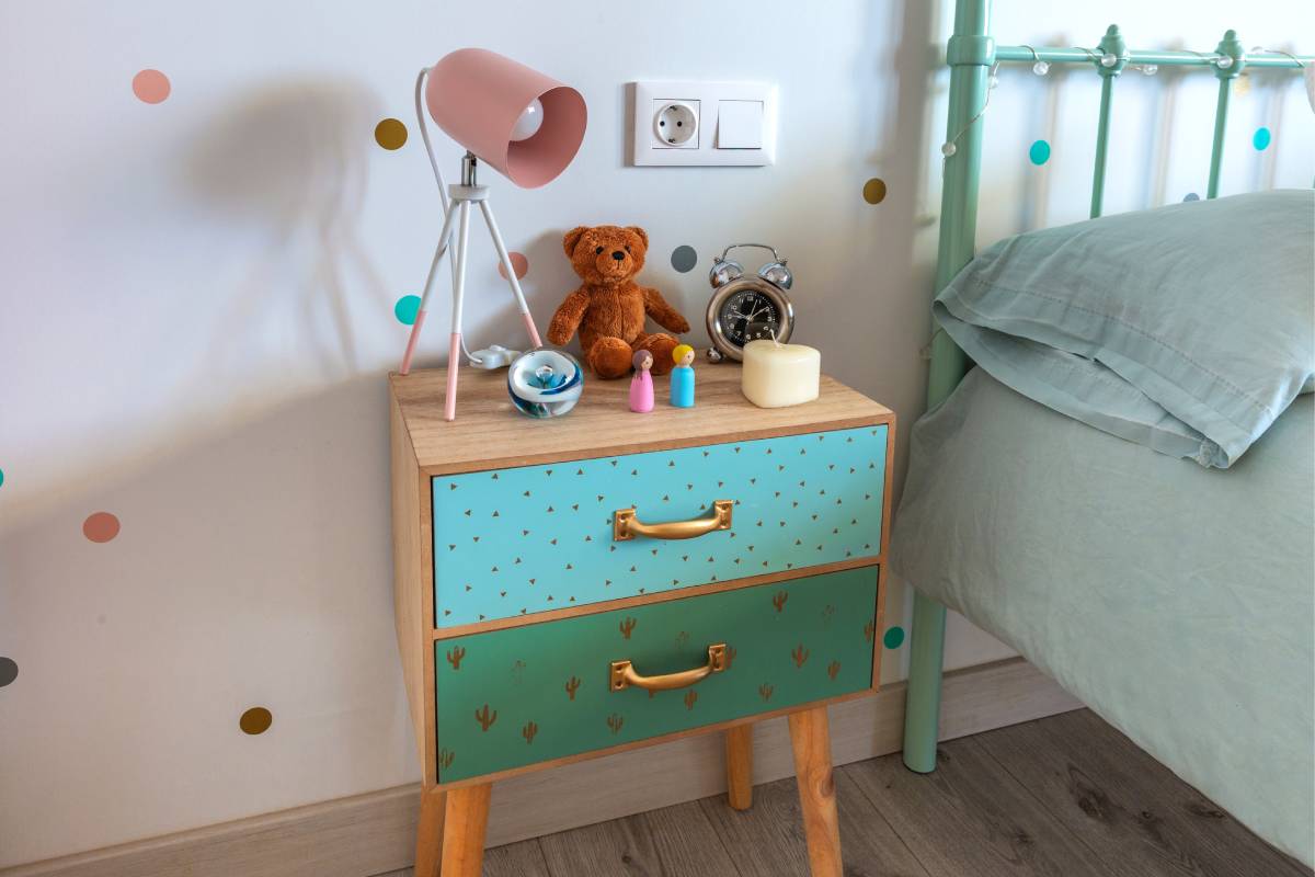 ids nightstand beside a child's bed